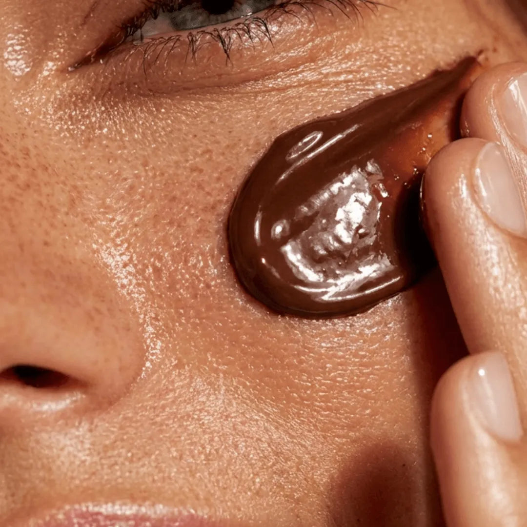 Luxury chocolate texture on skin, representing the sensory experience of premium personalised chocolate bars.